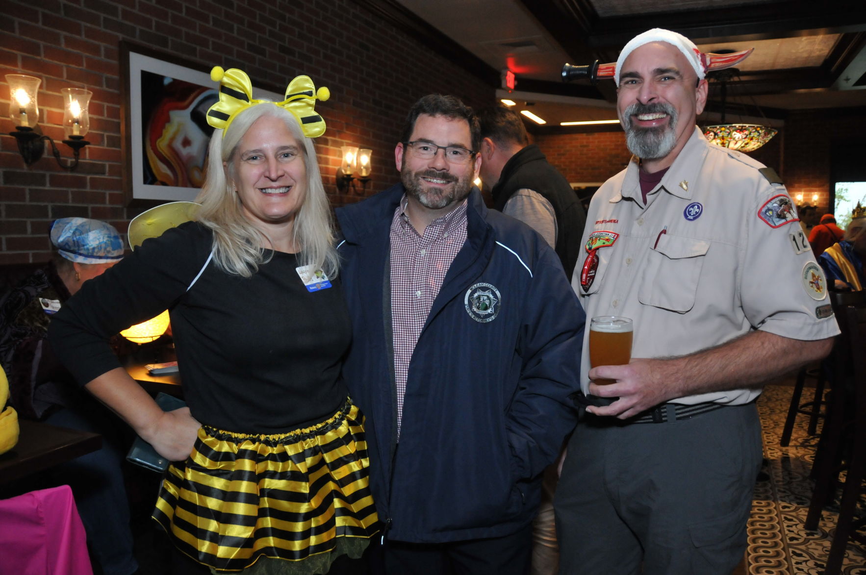 Sunrise Rotary president Laura Pritts, Don Knapp, Jon Pritts